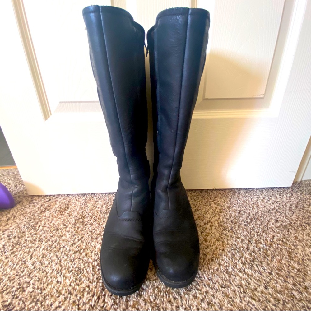 Merrell knee high snow boots.